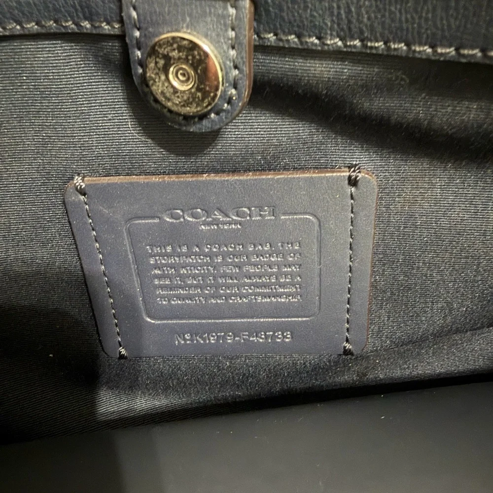 Large Coach handbag.  Purple/ grey color